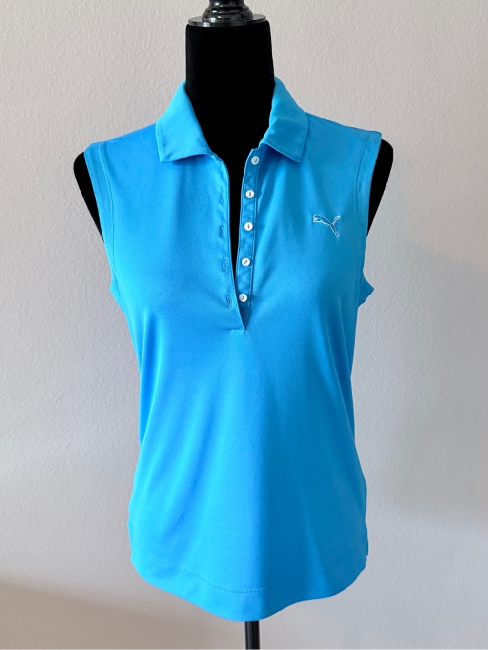 Puma Women’s Sleeveless Golf Polo Top in Bright Blue